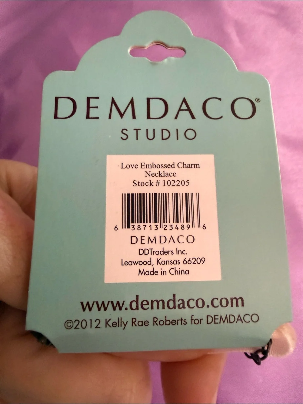 Demdaco white ribbon